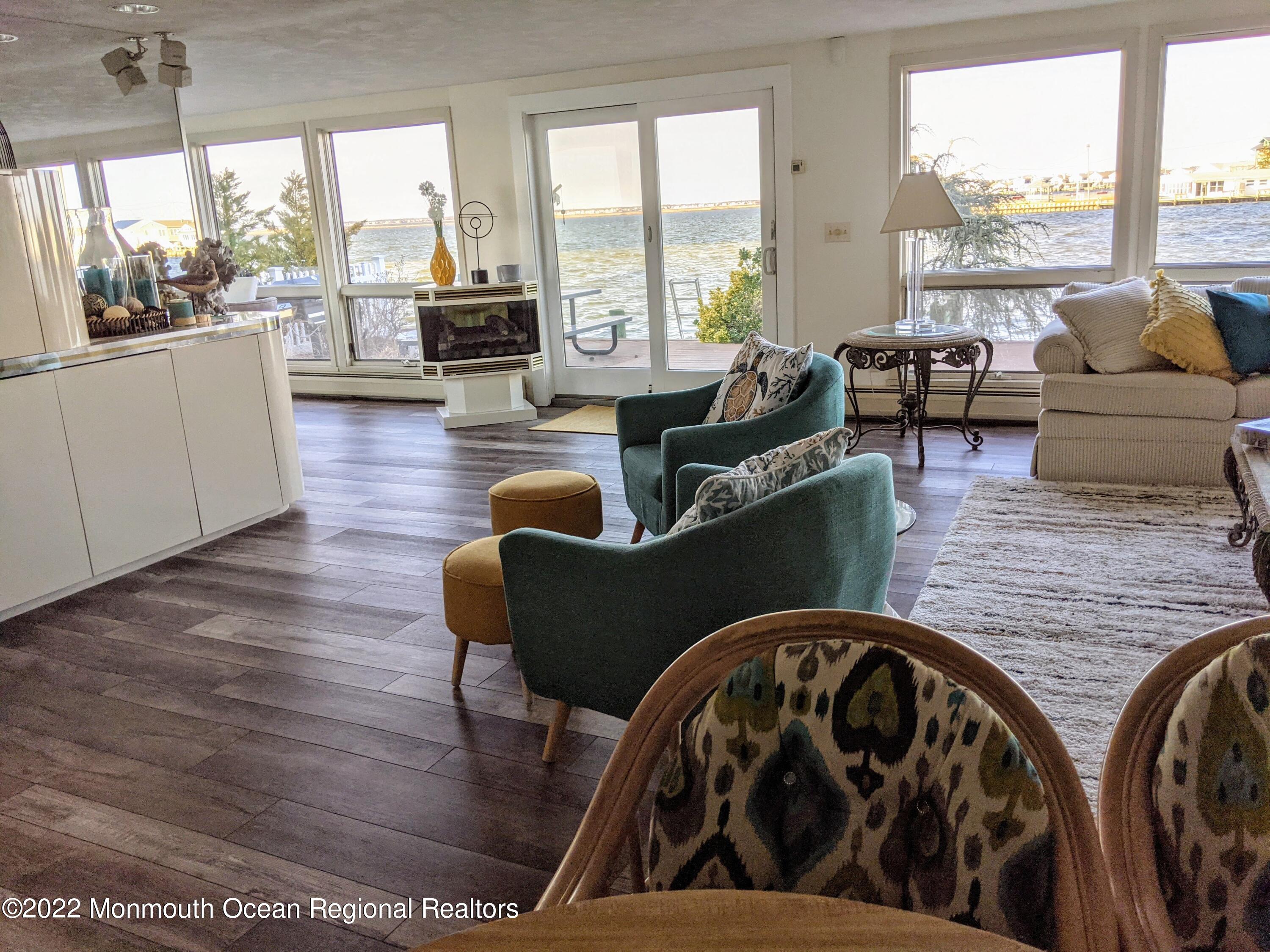 289 Monterey Circle Lavallette, NJ 08735 - Photo 22 of 32 a living room with furniture and a large window