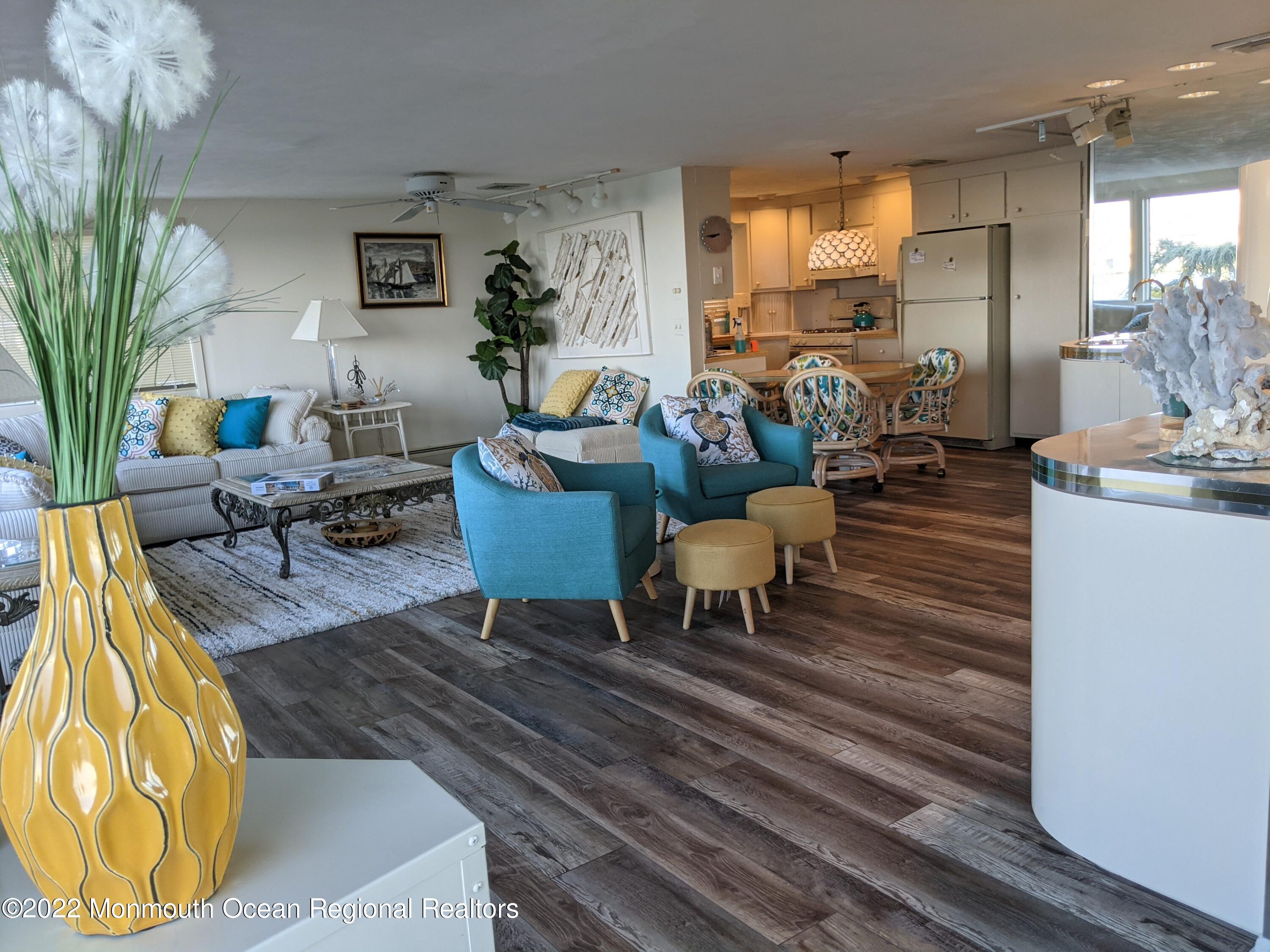 289 Monterey Circle Lavallette, NJ 08735 - Photo 23 of 32 a living room with furniture and a large window