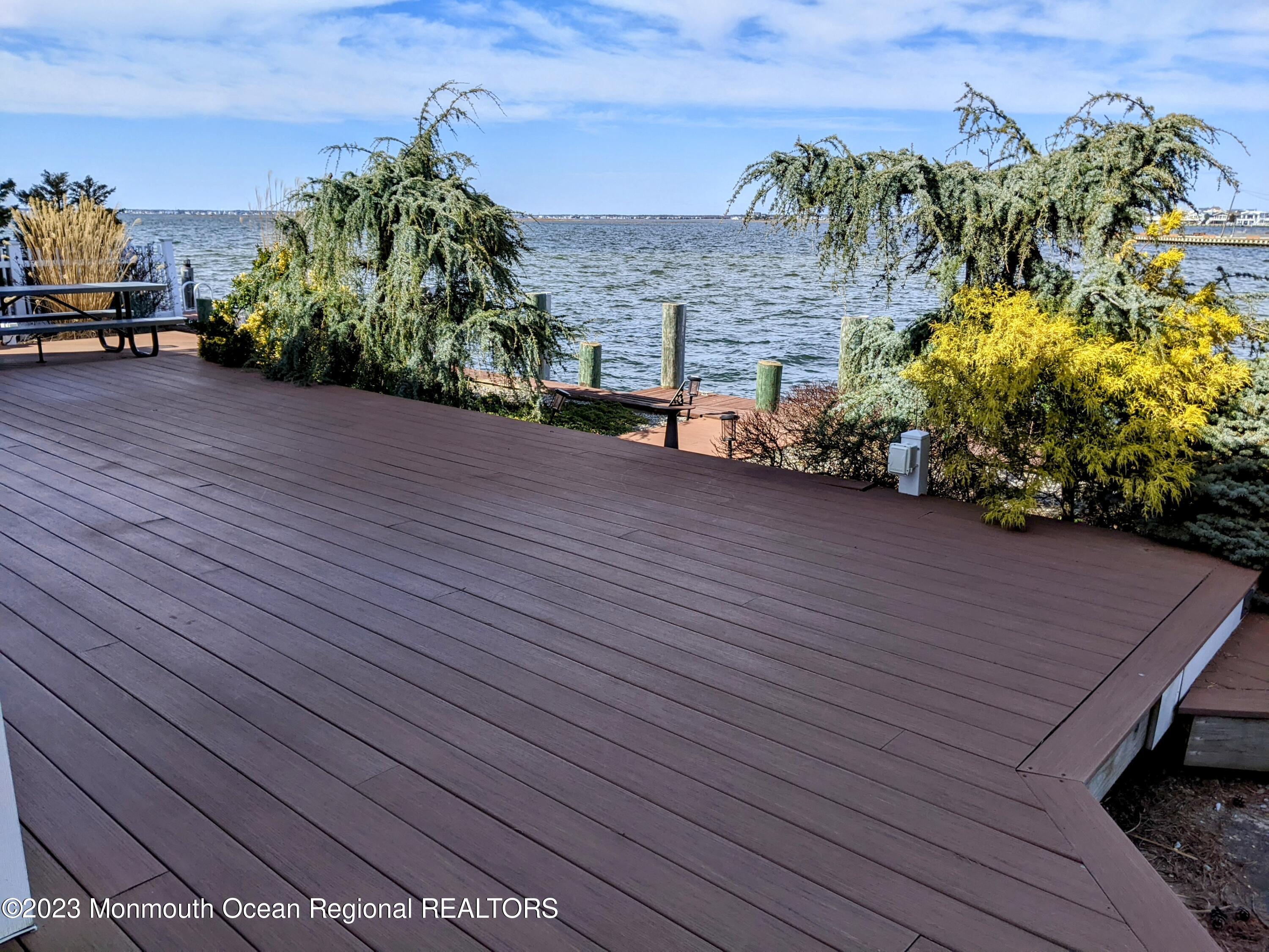 289 Monterey Circle Lavallette, NJ 08735 - Photo 30 of 32 a view of a terrace with a garden