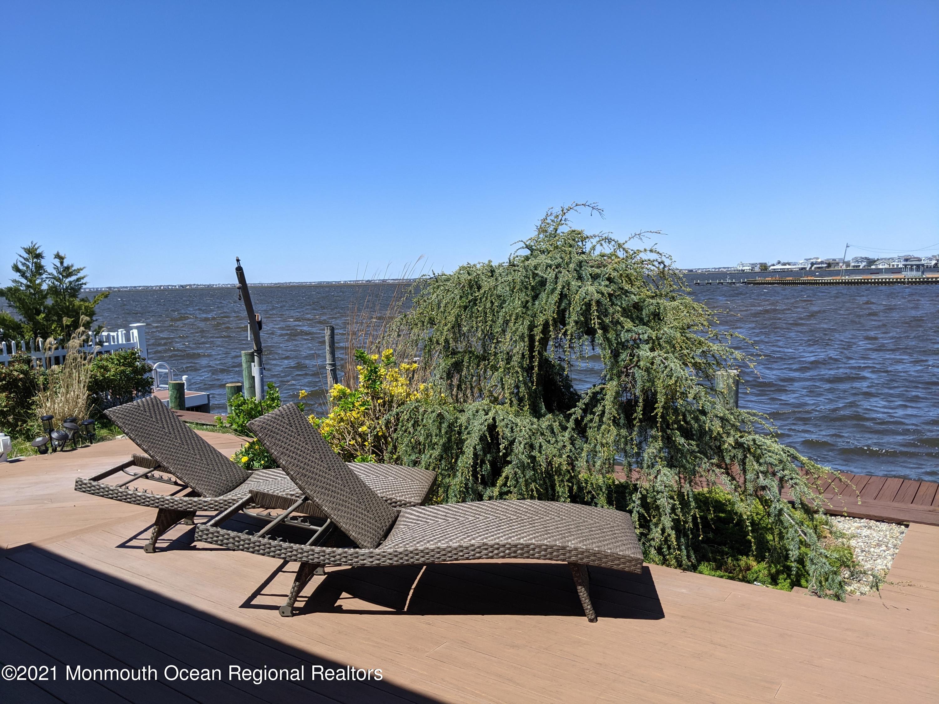 289 Monterey Circle Lavallette, NJ 08735 - Photo 31 of 32 a view of a terrace with chairs