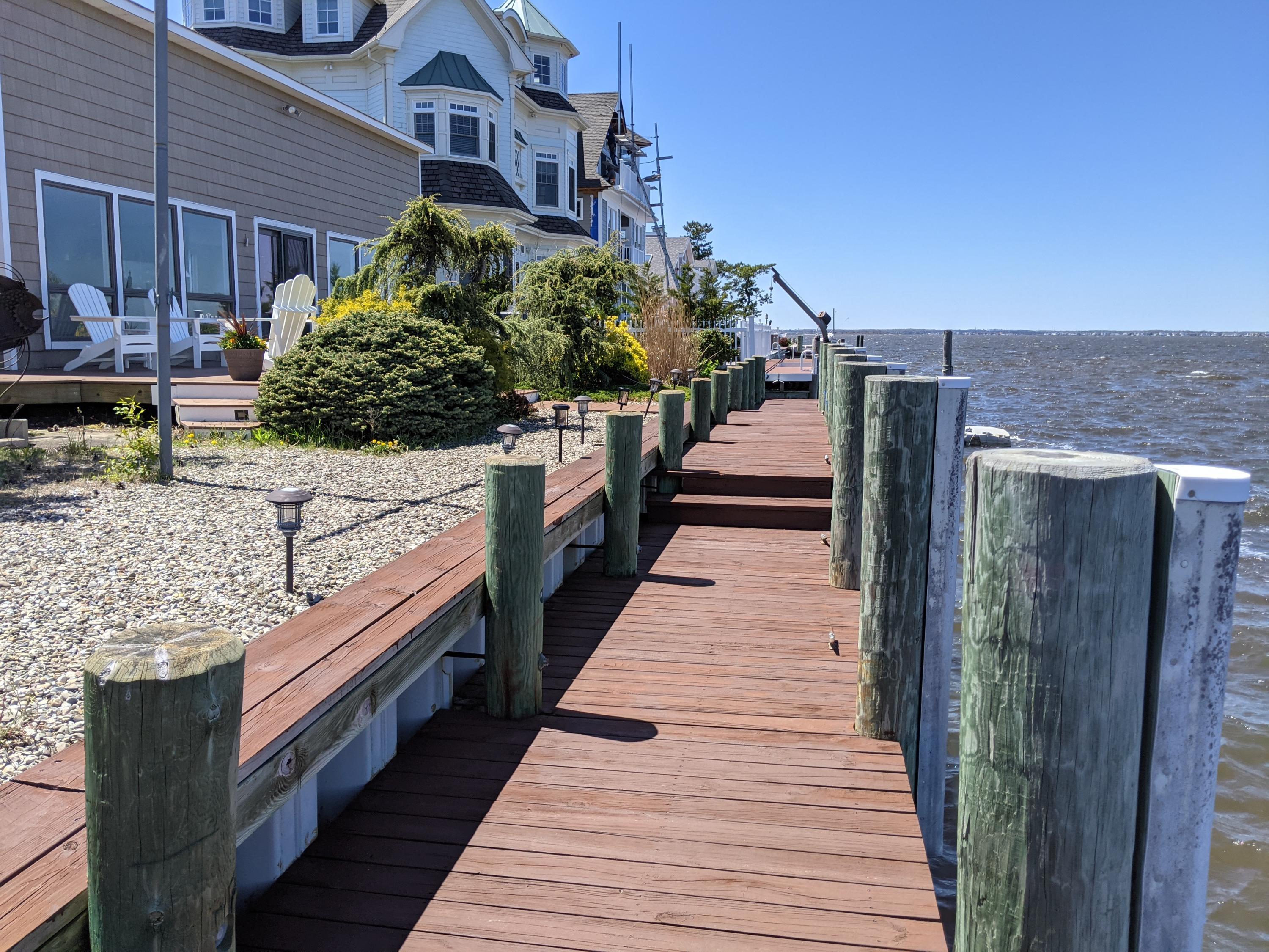 289 Monterey Circle Lavallette, NJ 08735 - Photo 4 of 32 a view of a house with a street