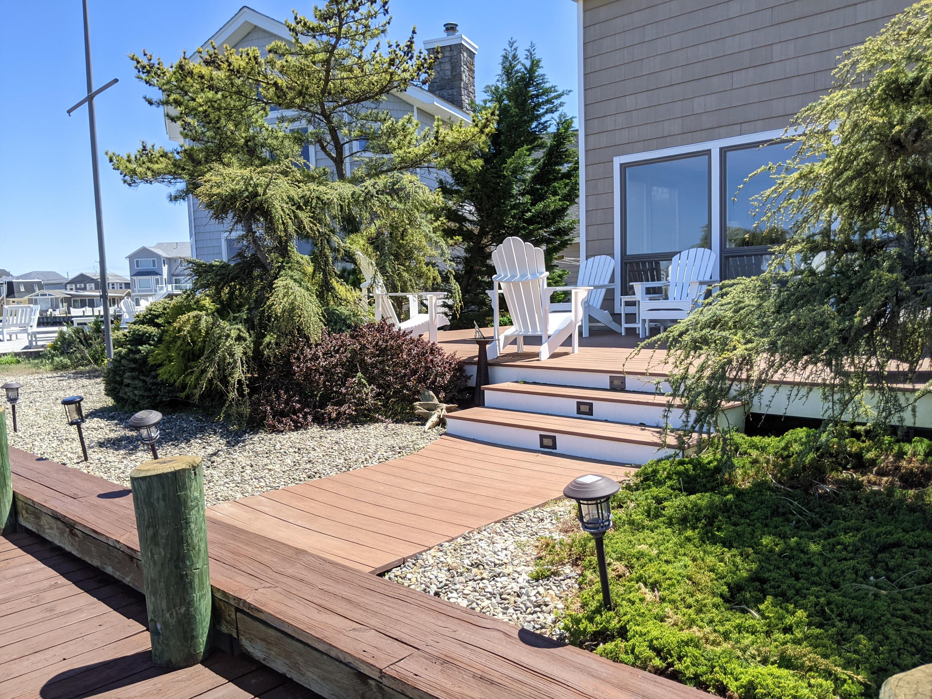 289 Monterey Circle Lavallette, NJ 08735 - Photo 6 of 32 a view of a backyard with sitting area