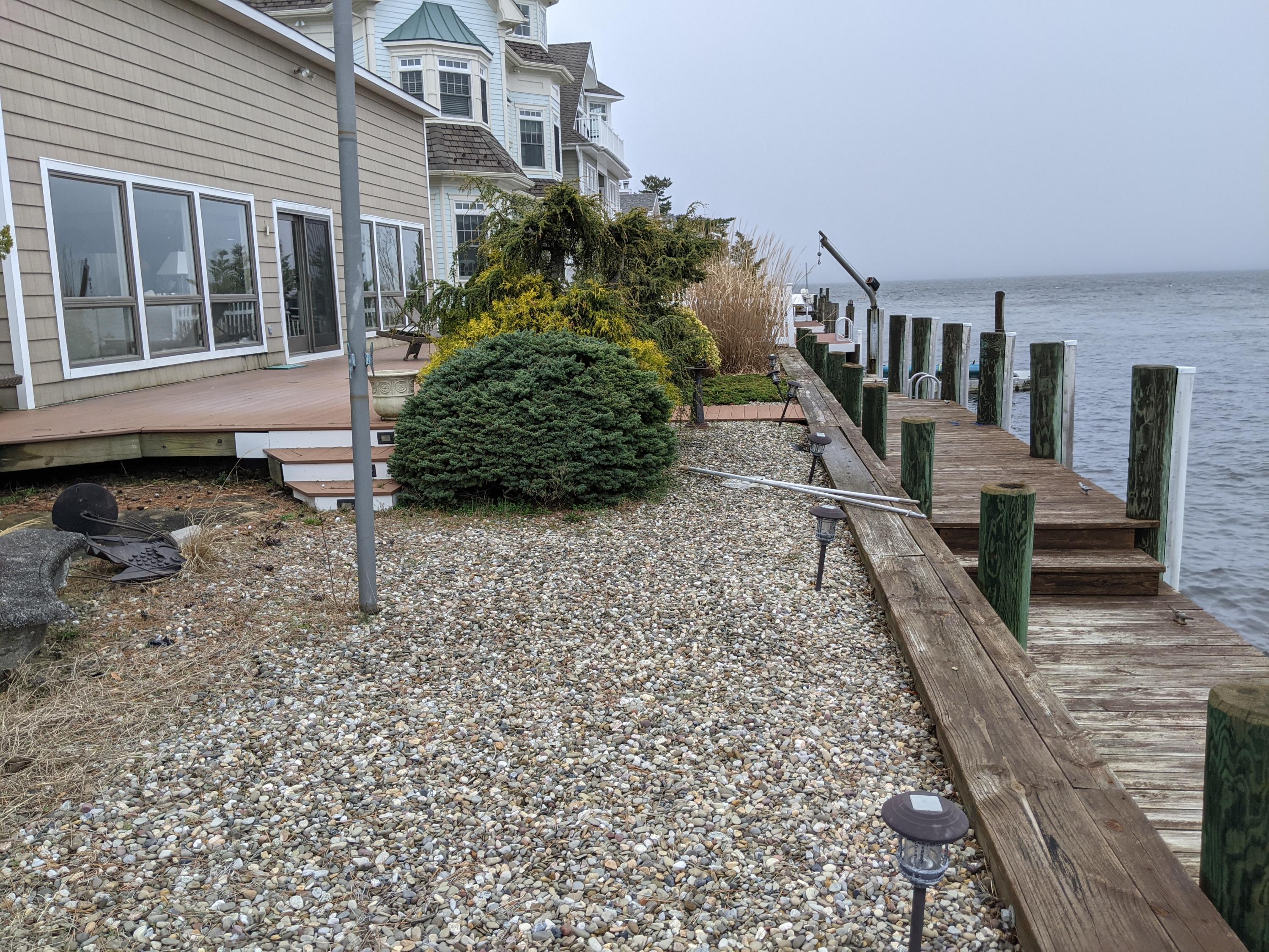 289 Monterey Circle Lavallette, NJ 08735 - Photo 7 of 32 a view of a house with backyard and sitting area