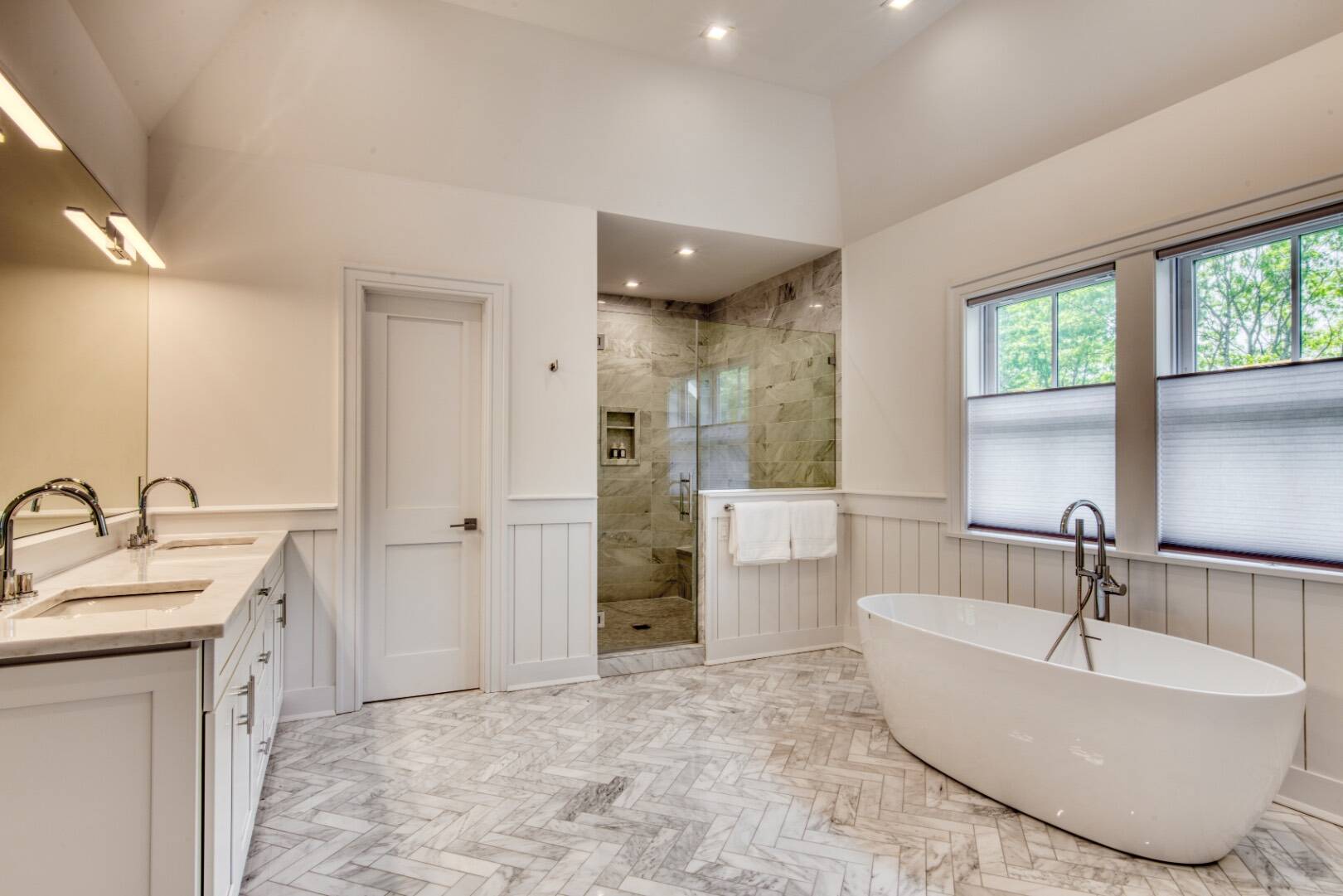 10 Dead Trail Road Water Mill, NY 11976 - Photo 11 of 19 a spacious bathroom with a tub sink and mirror