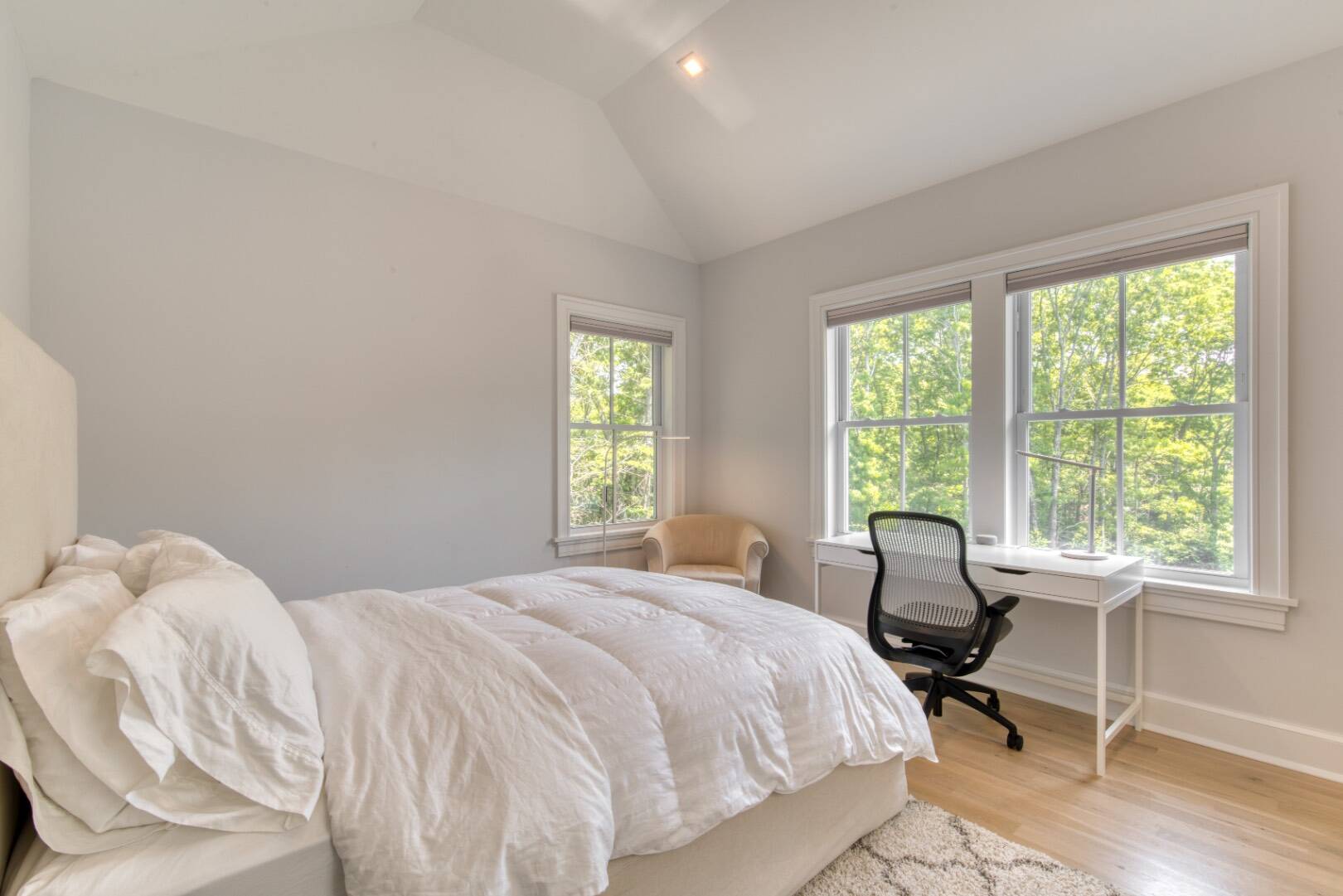 10 Dead Trail Road Water Mill, NY 11976 - Photo 14 of 19 a bedroom with a bed and a table