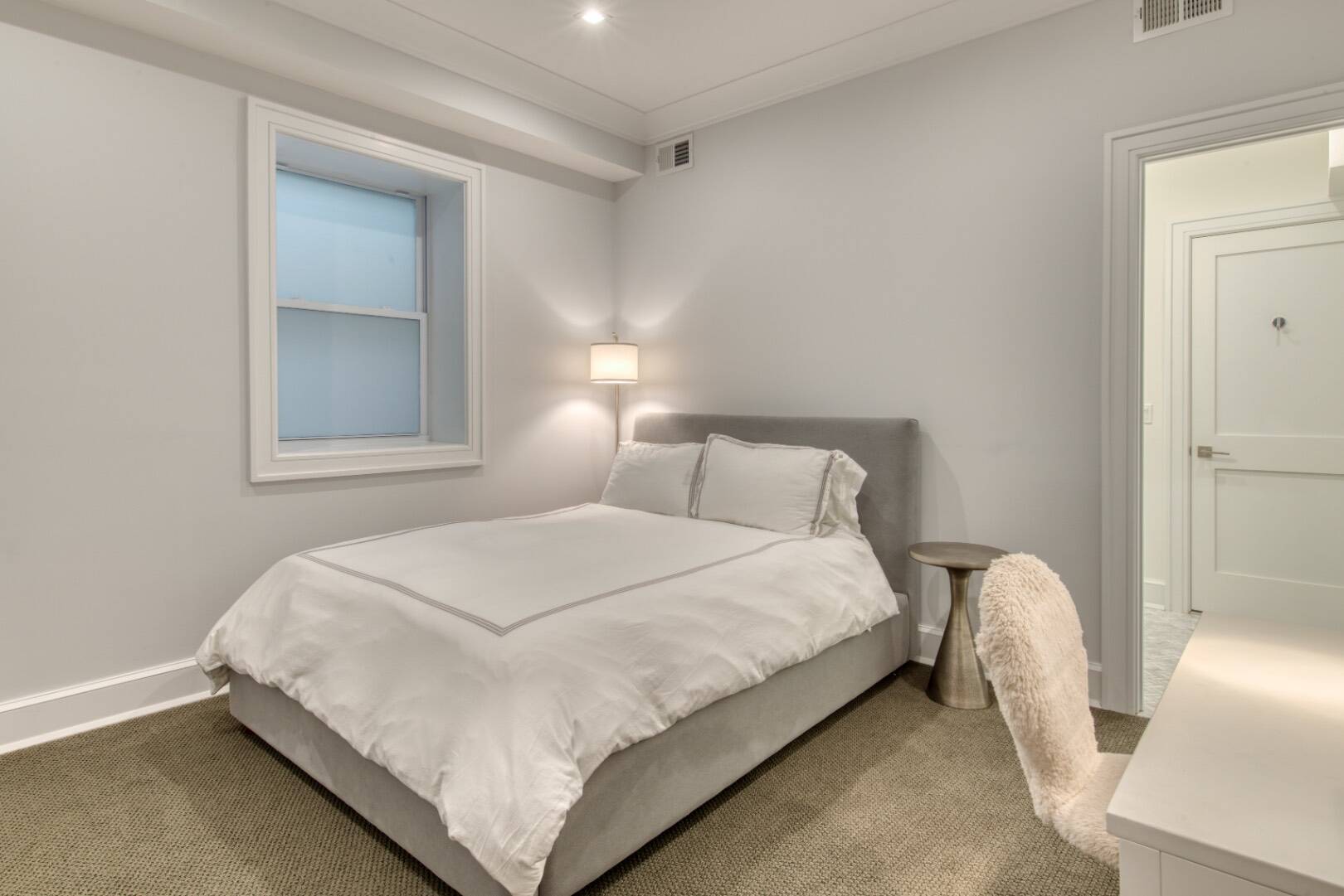 10 Dead Trail Road Water Mill, NY 11976 - Photo 15 of 19 a bedroom with a bed and a window