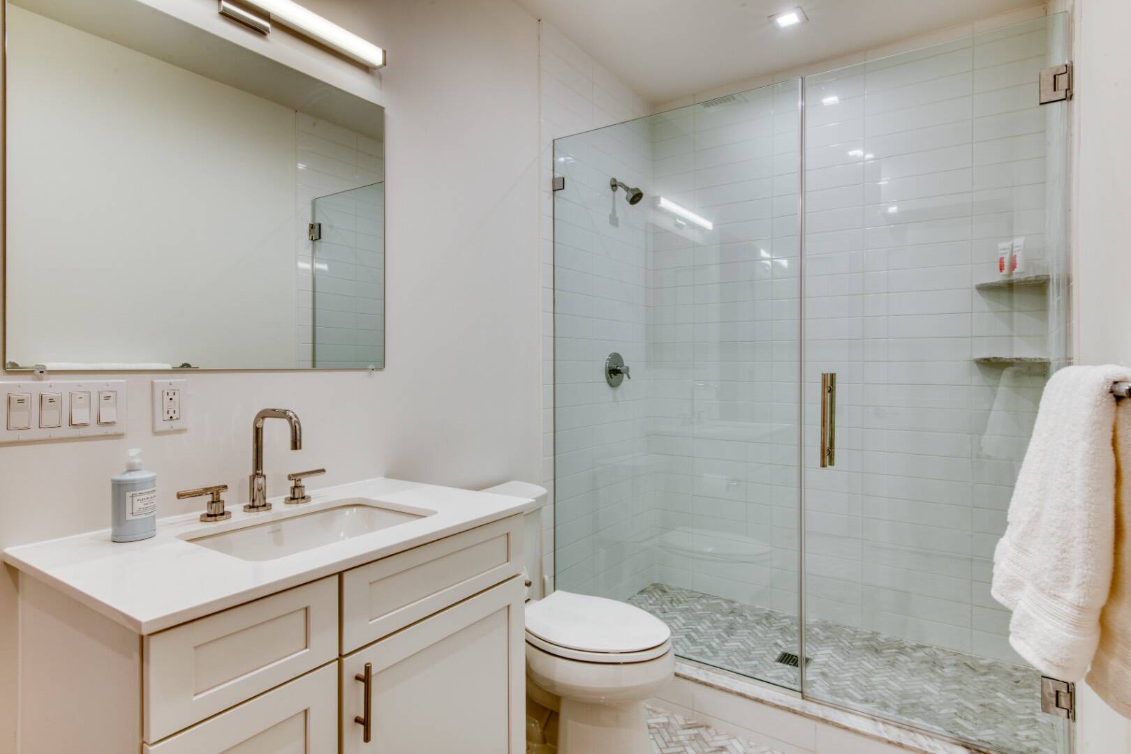 10 Dead Trail Road Water Mill, NY 11976 - Photo 17 of 19 a bathroom with a sink toilet and shower