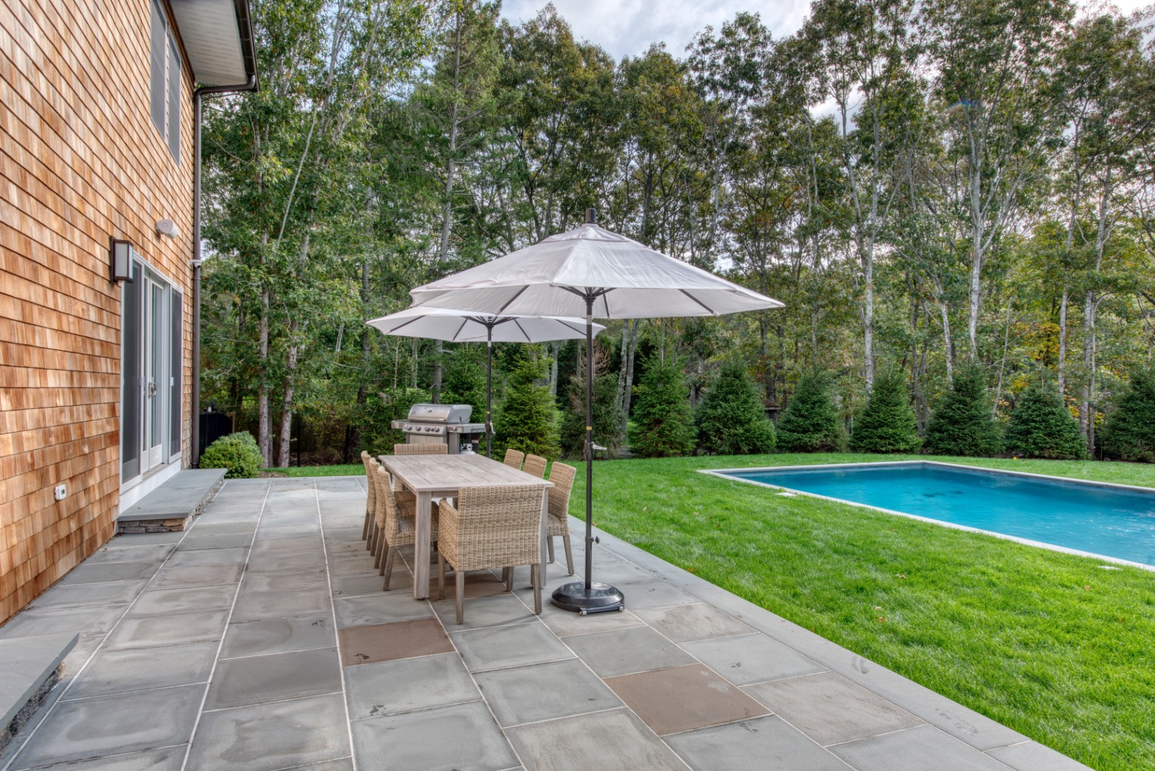 10 Dead Trail Road Water Mill, NY 11976 - Photo 3 of 19 a view of backyard with seating space