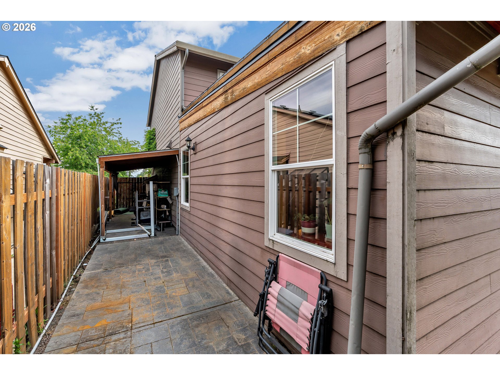 21498 Southwest Jay Street Beaverton, OR 97003 - Photo 46 of 47 a view of a house with a backyard