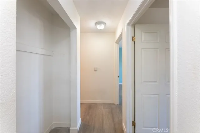 a view of a livingroom with wooden floor