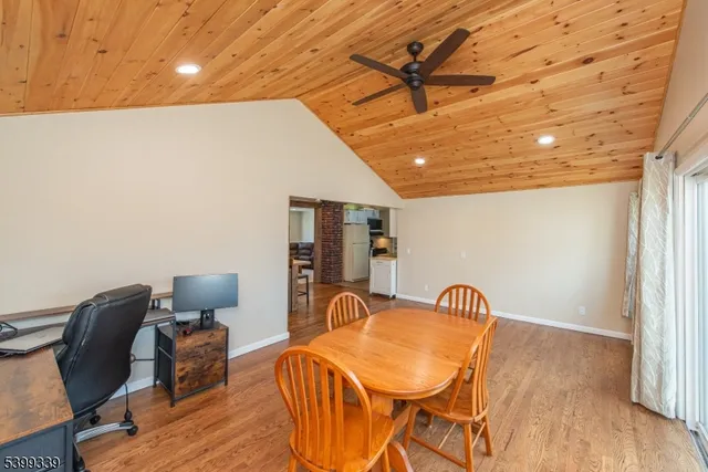 a workspace with furniture and wooden floor