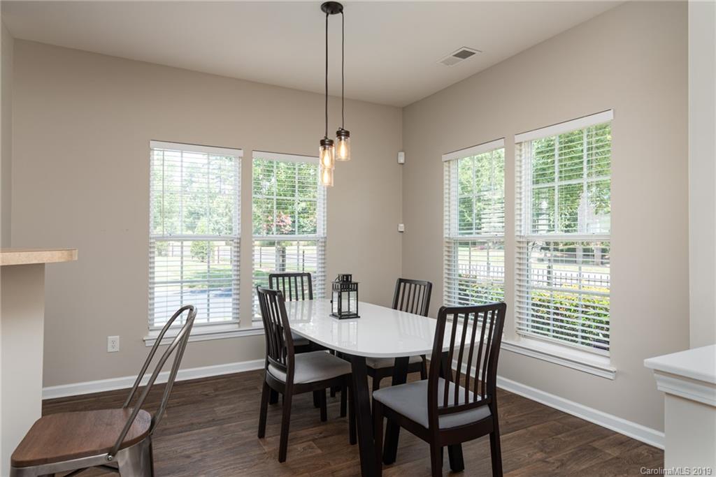 4854 Prosperity Ridge Road Charlotte, NC 28269 - Photo 6 of 22 a view of a dining room with furniture window and outside view