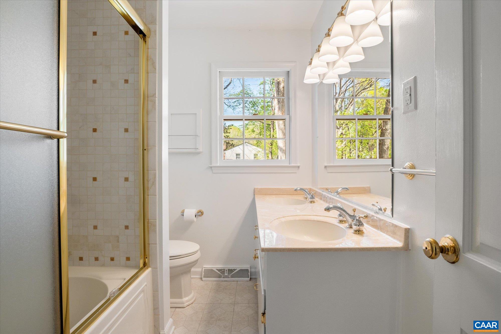 503 Carrsbrook Drive Charlottesville, VA 22901 - Photo 26 of 58 a bathroom with a sink a toilet and shower