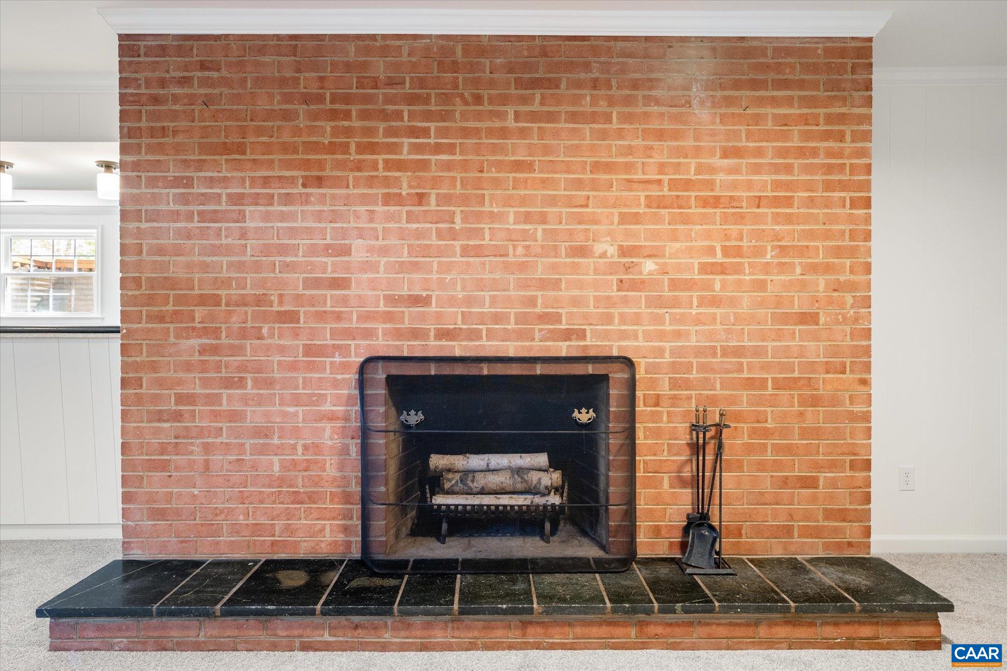 503 Carrsbrook Drive Charlottesville, VA 22901 - Photo 34 of 58 a stone house with fireplace