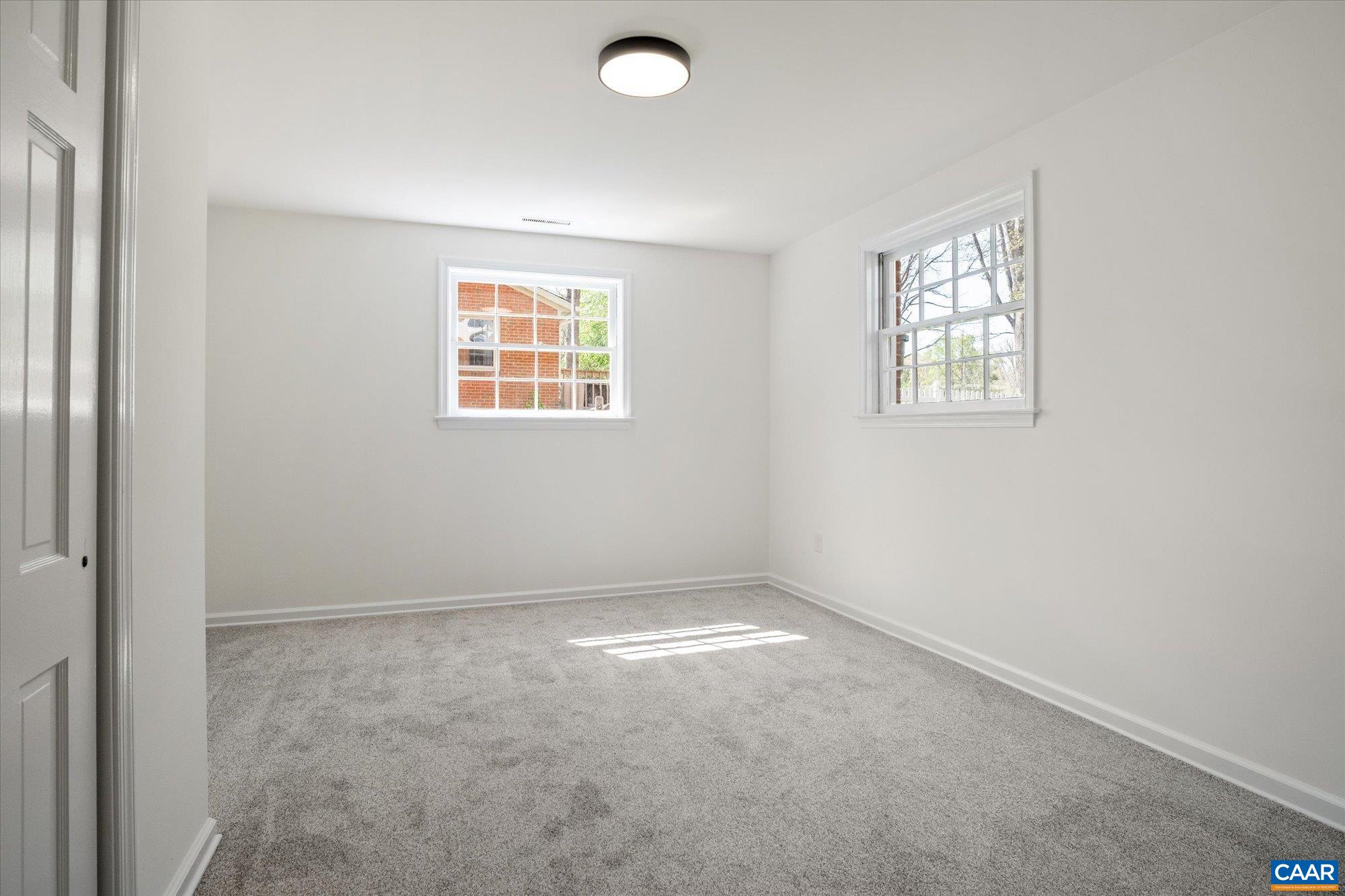 503 Carrsbrook Drive Charlottesville, VA 22901 - Photo 40 of 58 an empty room with windows