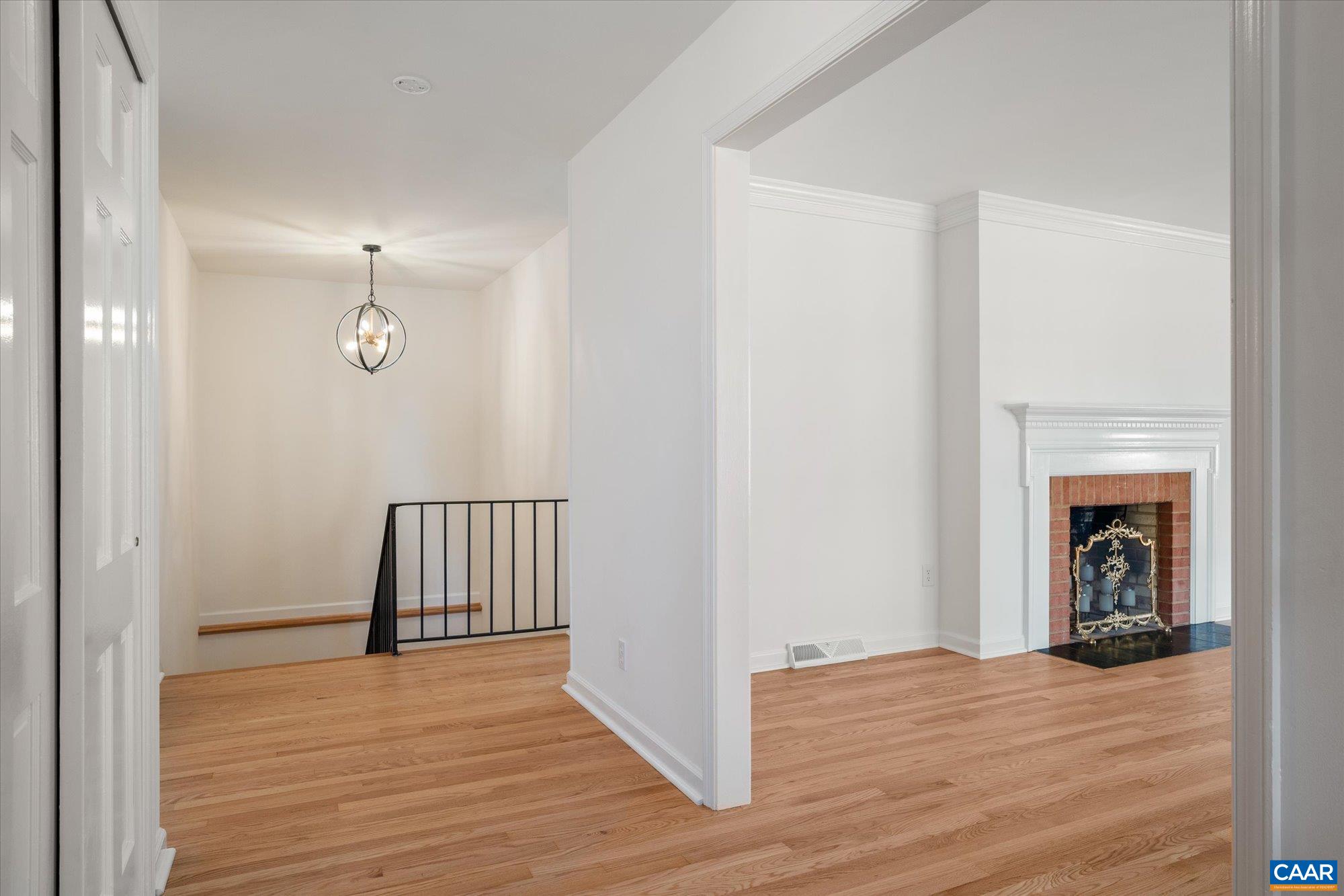 503 Carrsbrook Drive Charlottesville, VA 22901 - Photo 8 of 58 a view of livingroom with hallway and wooden floor