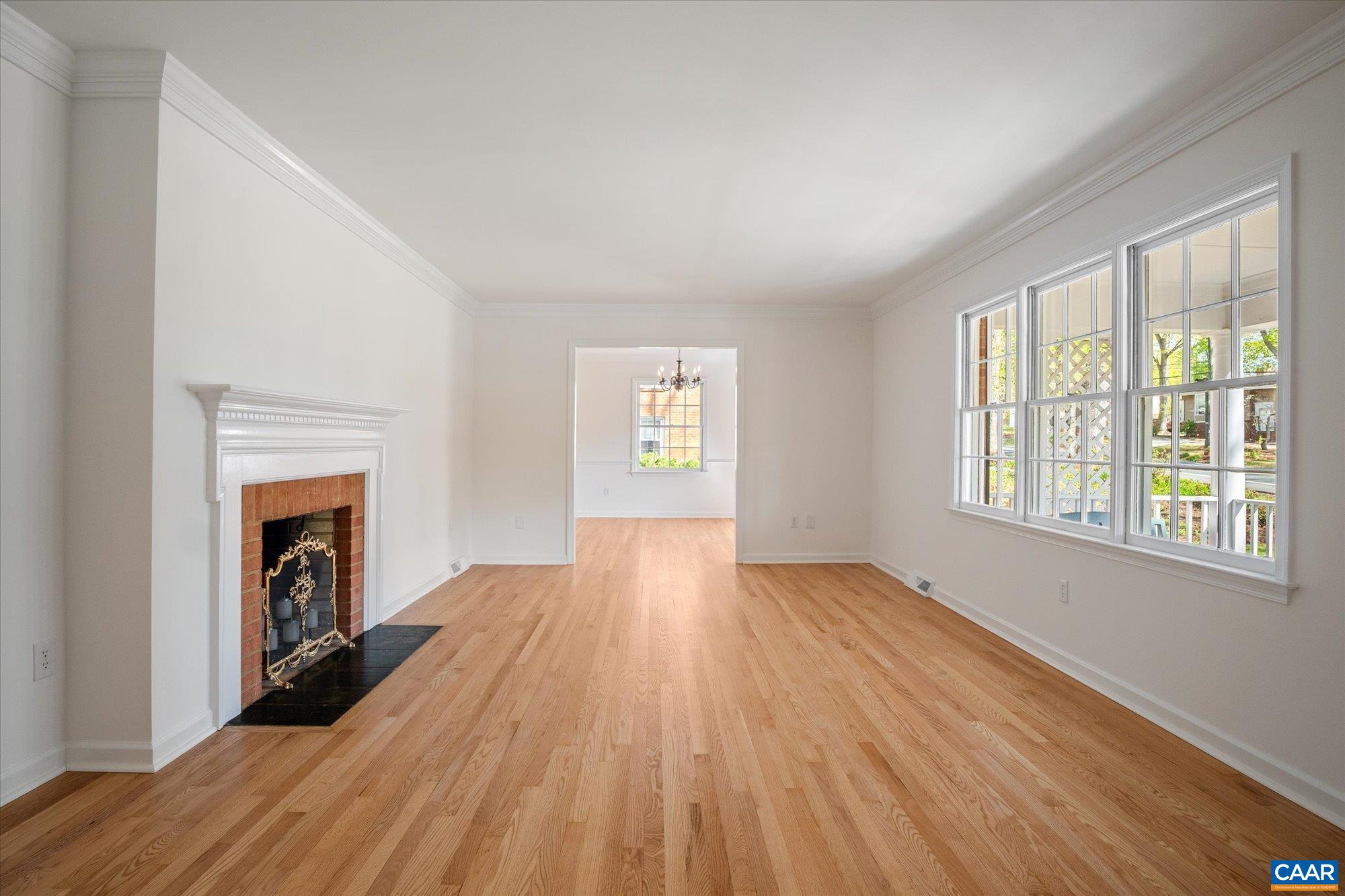 503 Carrsbrook Drive Charlottesville, VA 22901 - Photo 9 of 58 wooden floor fireplace and windows in an empty room