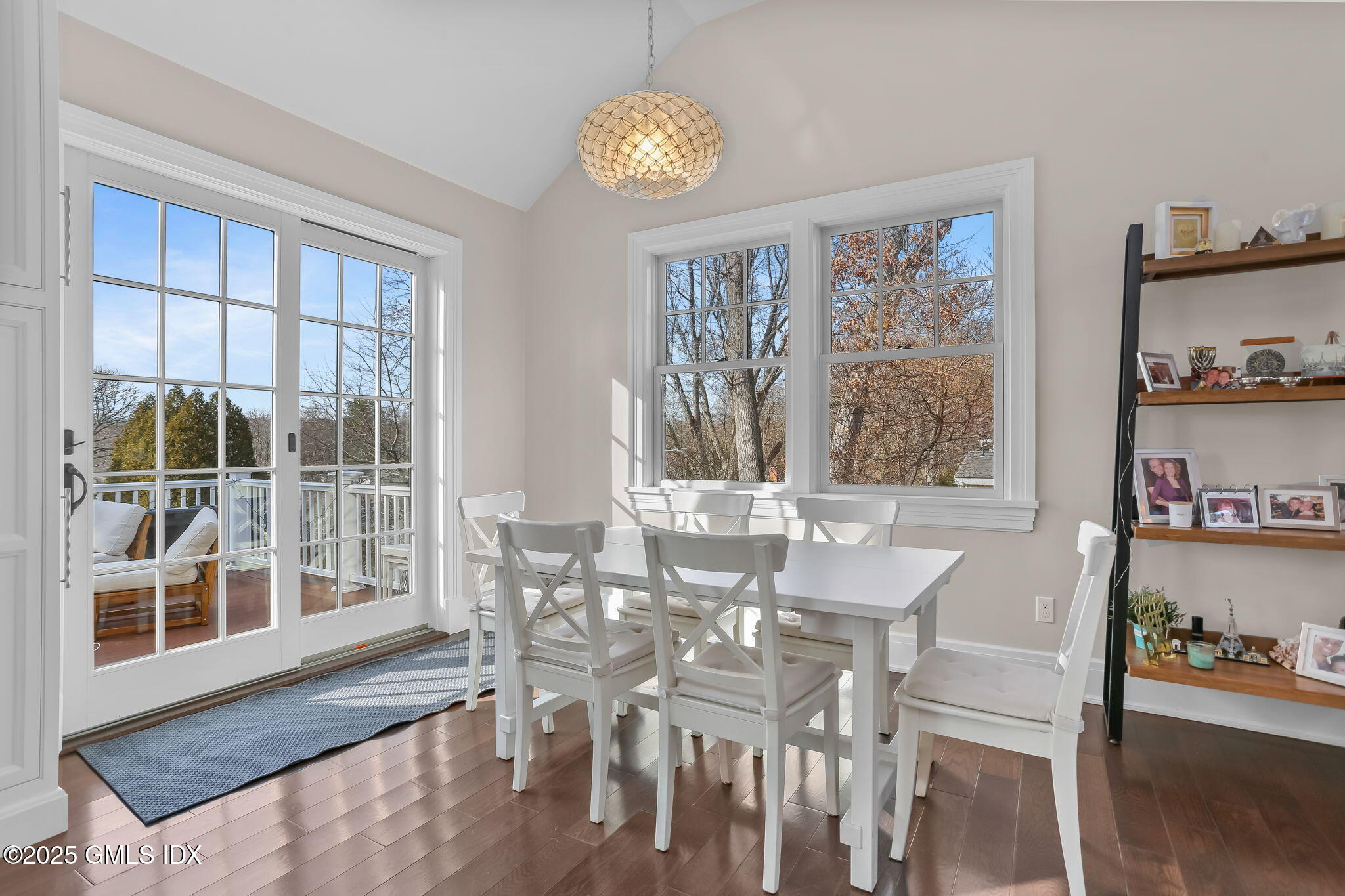 19 Crawford Terrace Riverside, CT 06878 - Photo 6 of 26 a view of a dining room with furniture large window and wooden floor