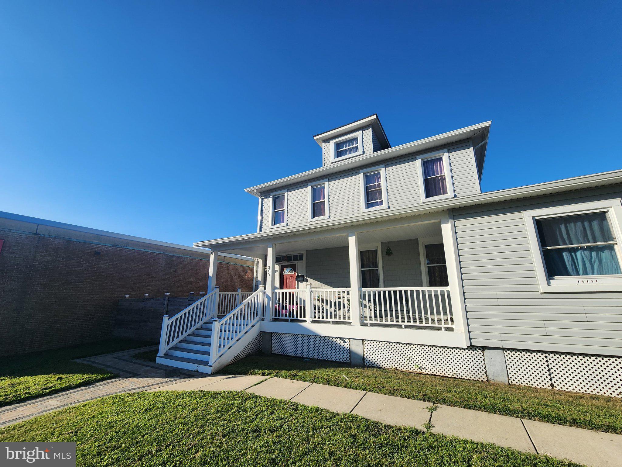 302 East Patapsco Avenue Baltimore, MD 21225 - Photo 1 of 3 Charming two-story home with porch.