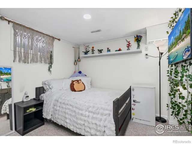 a bedroom with a bed and furniture