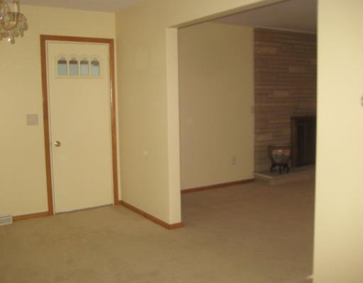 124 Meadowbrook Road Renfrew, PA 16053 - Photo 14 of 16 Entry/Foyer. From dining room door to sun porch & portion of living room