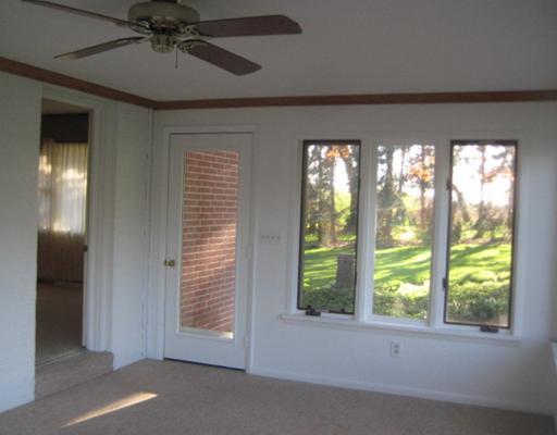 124 Meadowbrook Road Renfrew, PA 16053 - Photo 15 of 16 Sunroom. Looking into dining room & Door to the back yard.....