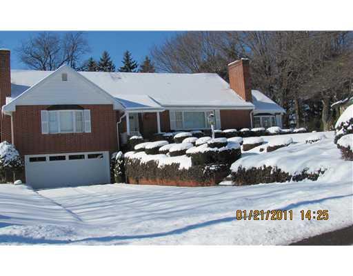 Exterior Front. A Winter blanket of snow