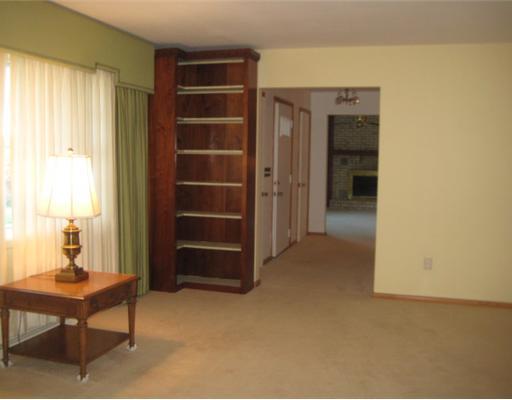 124 Meadowbrook Road Renfrew, PA 16053 - Photo 9 of 16 Living Room. From living room into hallway & family room.... Removable book shelving