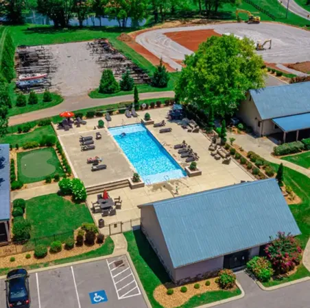 an aerial view of a house having yard