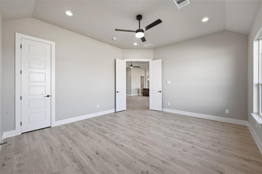 108 Rocky Top Azle, TX 76020 - Photo 22 of 40 wooden floor in an empty room with a window
