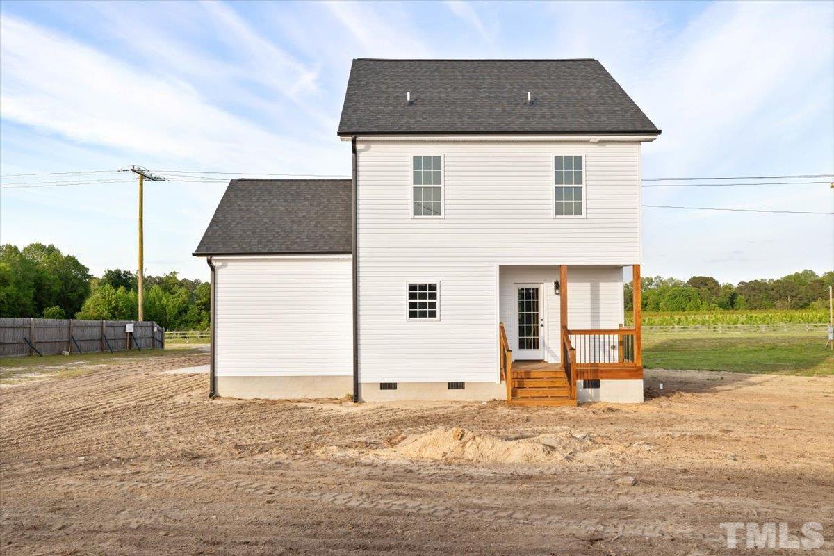 2075 Highway 55 Coats, NC 27521 - Photo 23 of 24 a backyard of a house