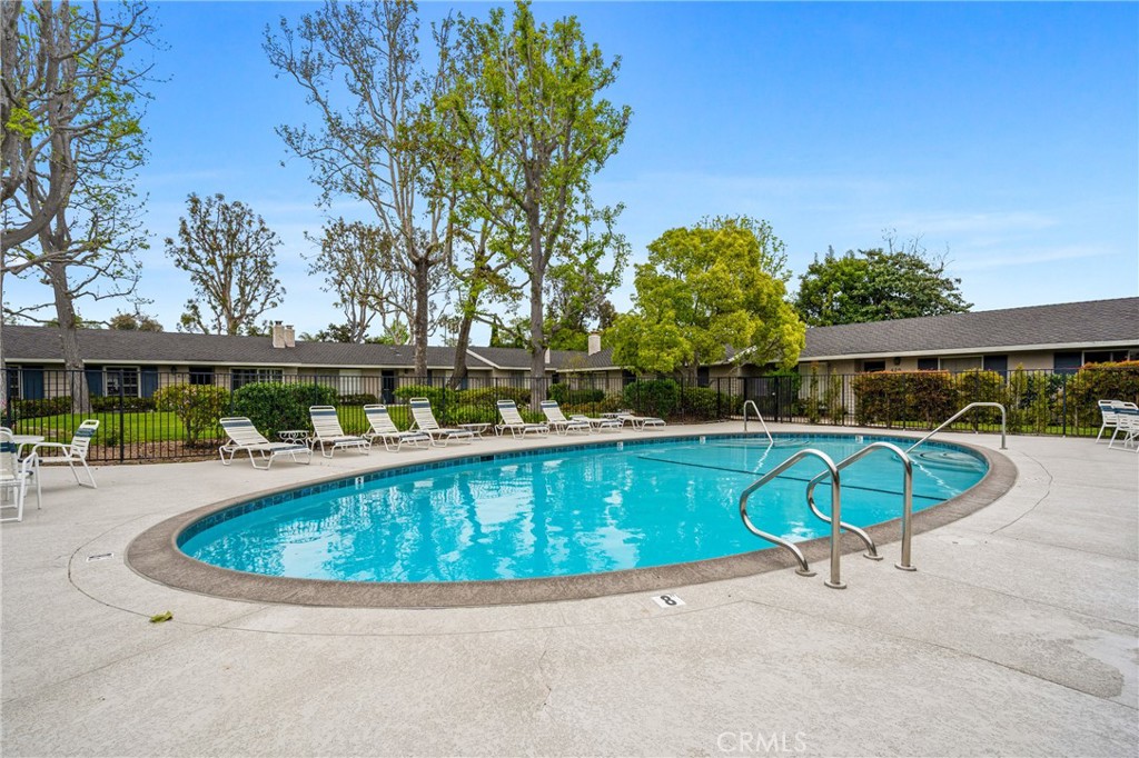 417 Gloucester Drive Costa Mesa, CA 92627 - Photo 27 of 29 a view of a swimming pool with a patio