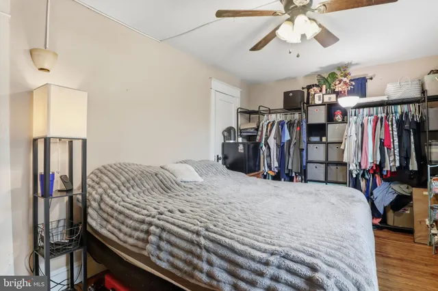 a bed room with a bed and a walk in closet