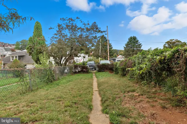 a front view of a building with garden