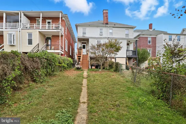 a car parked in front of a house