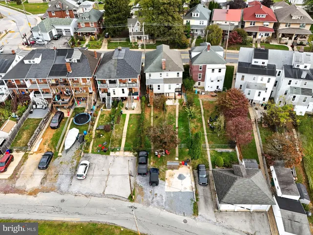 an aerial view of a city with lots of residential buildings