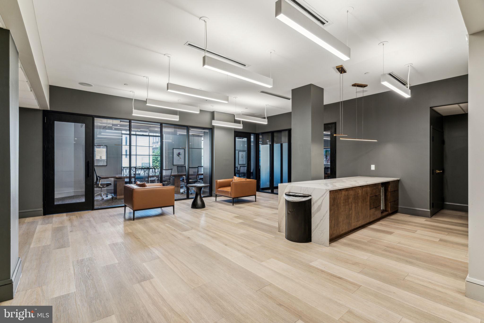 875 Sansom Street, Unit 1717 Philadelphia, PA 19107 - Photo 30 of 35 a living room with furniture and wooden floor