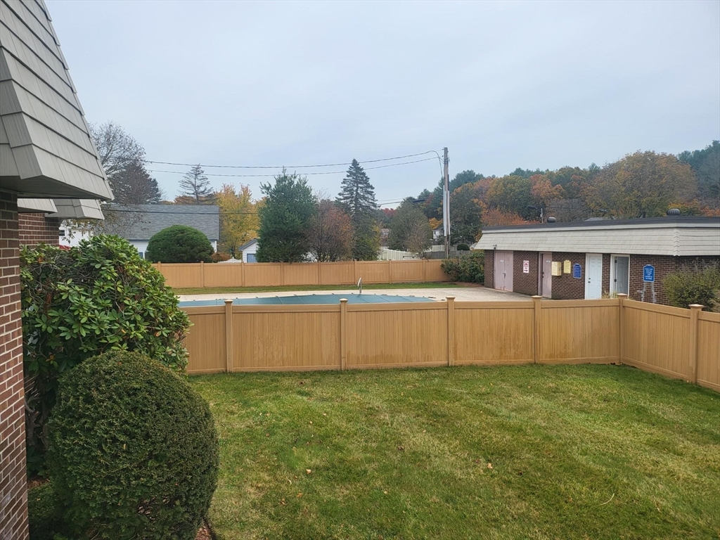 1 Hallmark Gardens, Unit 1 Burlington, MA 01803 - Photo 14 of 14 a view of a house with a yard