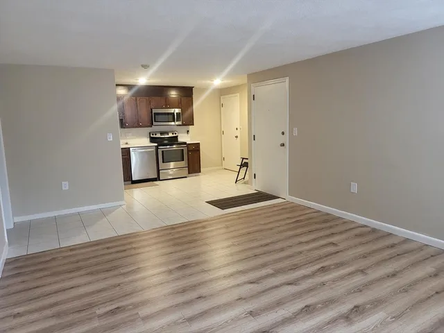 a view of kitchen with wooden floor