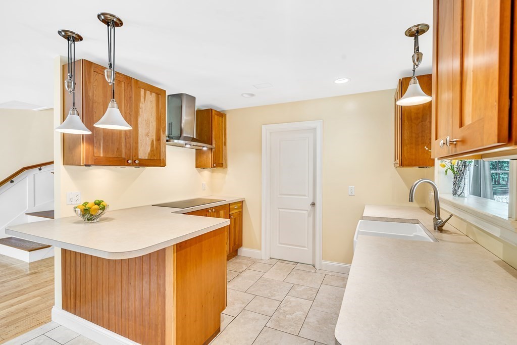 236 Gates Pond Road Berlin, MA 01503 - Photo 13 of 42 a bathroom with a tub sink and mirror