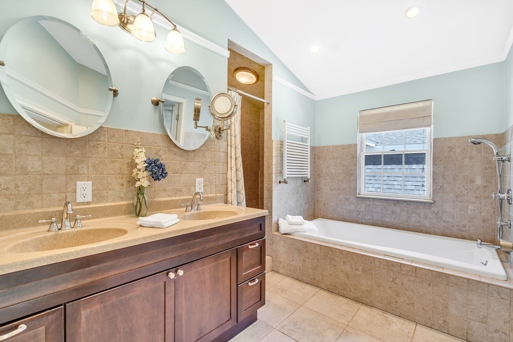 236 Gates Pond Road Berlin, MA 01503 - Photo 23 of 42 a bathroom with a granite countertop tub sink and mirror