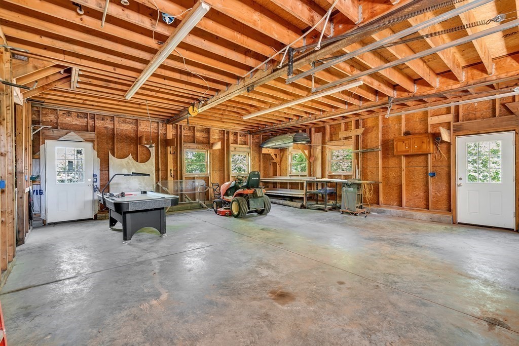 236 Gates Pond Road Berlin, MA 01503 - Photo 35 of 42 a view of a room with gym equipment