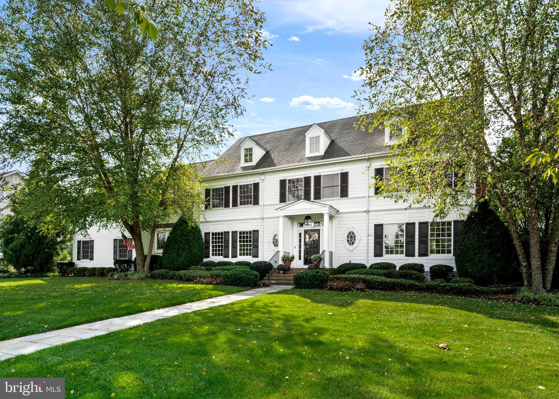 809 Matlack Drive Moorestown, NJ 08057 - Photo 2 of 67 a front view of a house with a yard table and trees