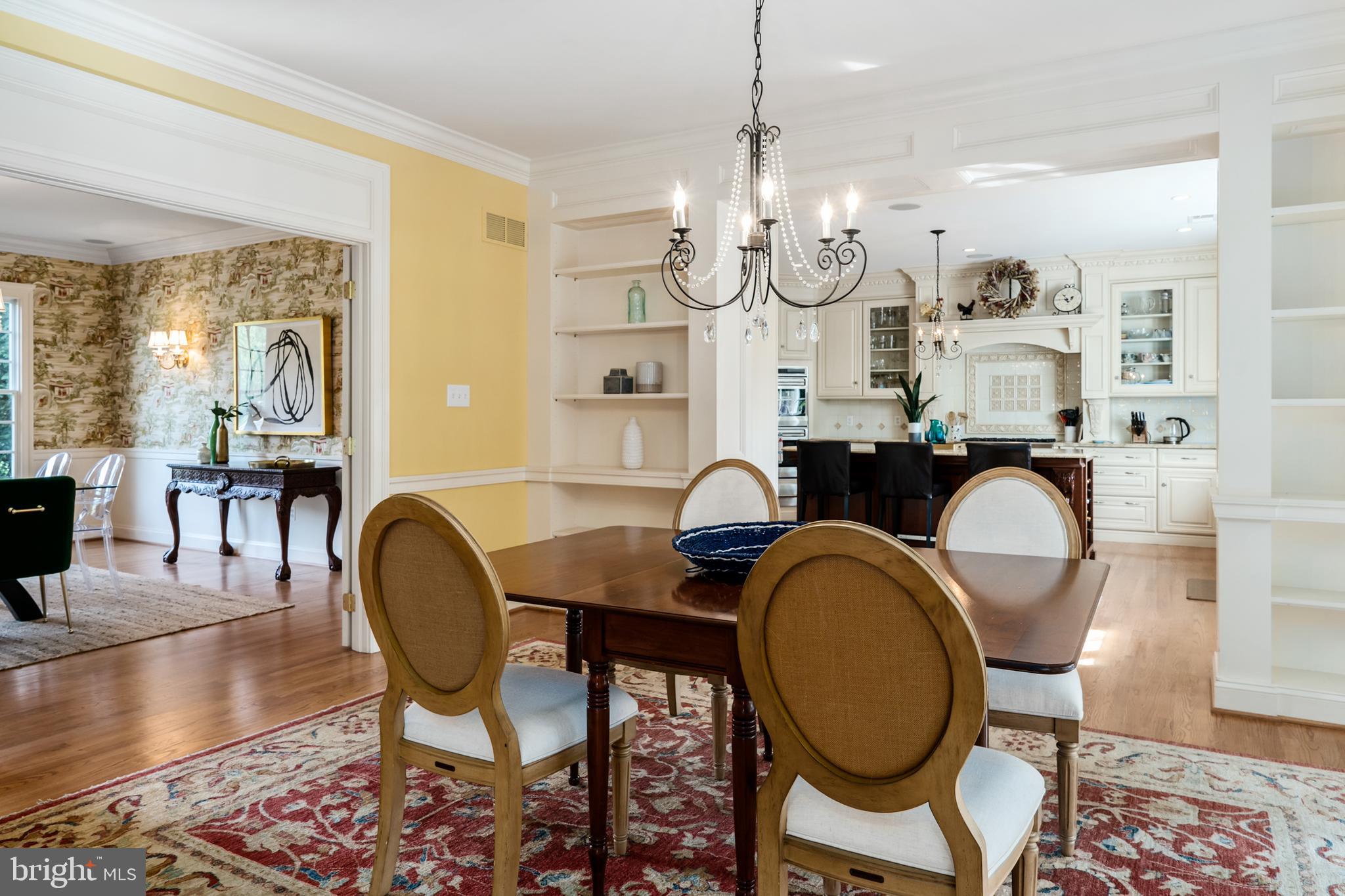 809 Matlack Drive Moorestown, NJ 08057 - Photo 18 of 67 a view of a dining room with furniture a chandelier and wooden floor