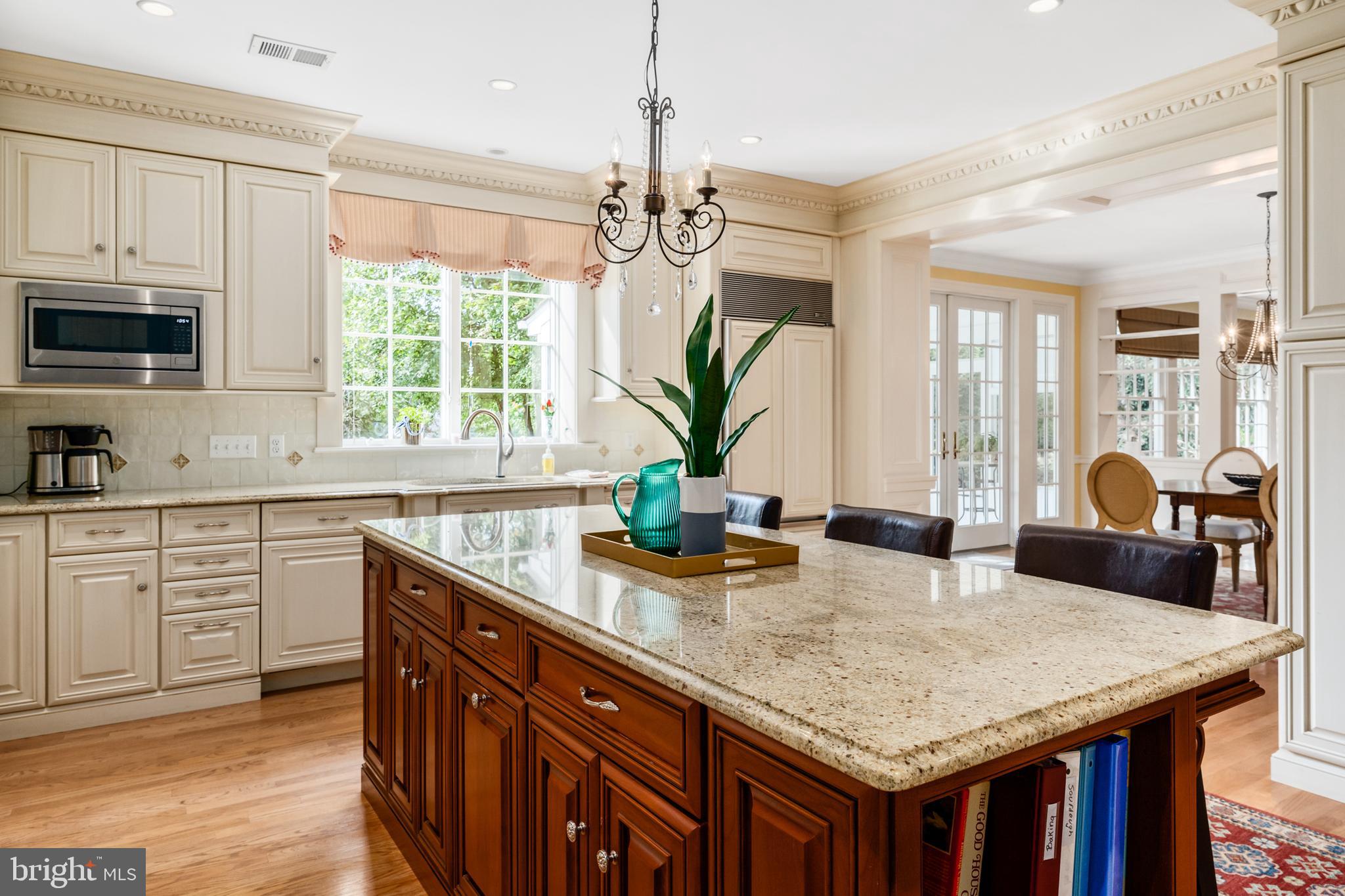 809 Matlack Drive Moorestown, NJ 08057 - Photo 27 of 67 a kitchen with kitchen island granite countertop a counter space windows and appliances
