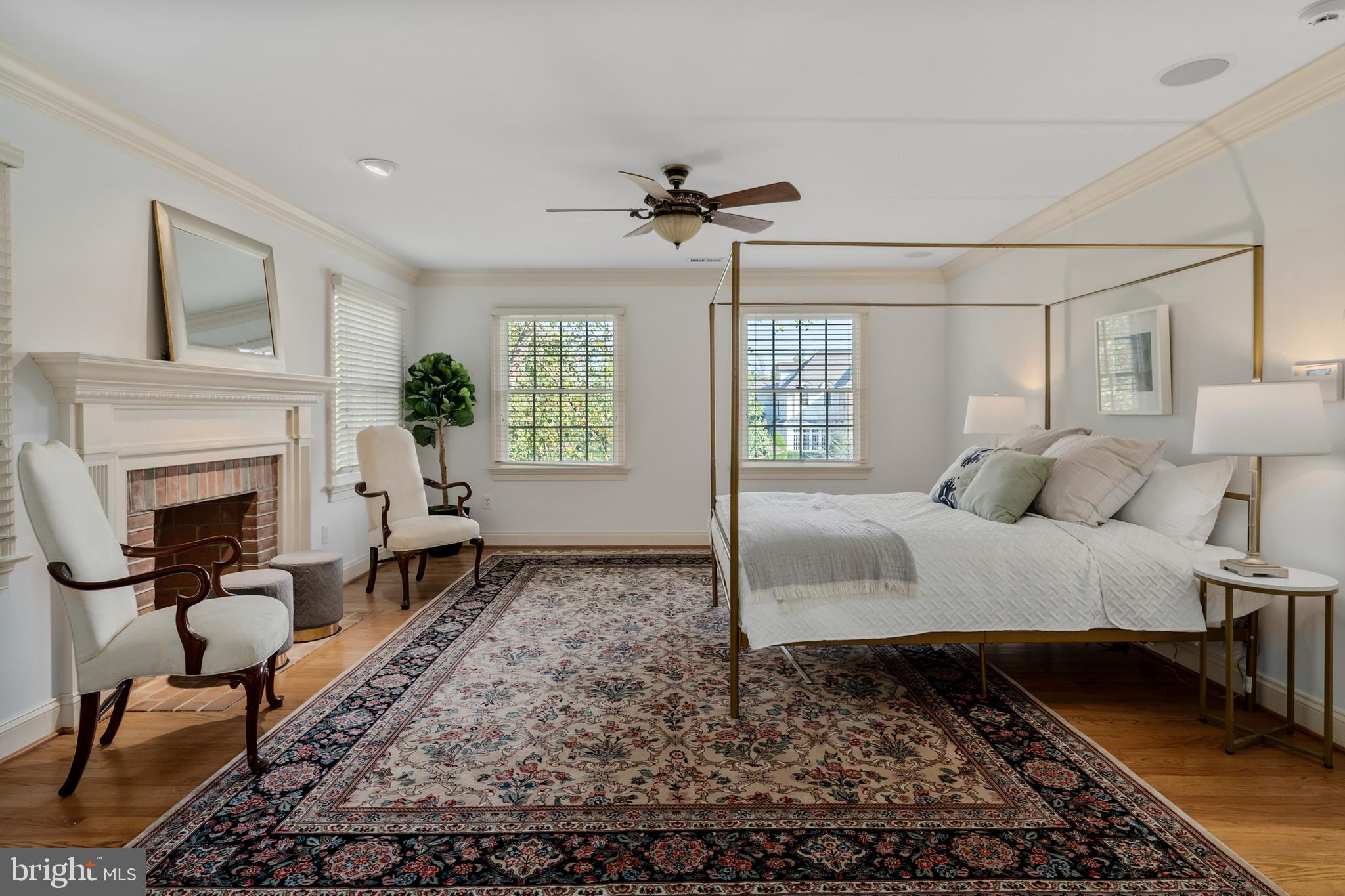 809 Matlack Drive Moorestown, NJ 08057 - Photo 34 of 67 a spacious bedroom with a bed a rug and a couch