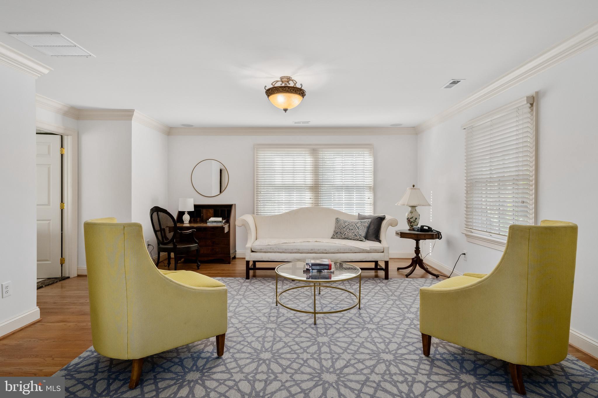 809 Matlack Drive Moorestown, NJ 08057 - Photo 35 of 67 a living room with furniture chairs and a window