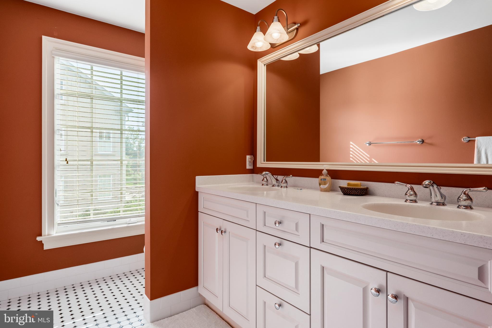 809 Matlack Drive Moorestown, NJ 08057 - Photo 45 of 67 a bathroom with a sink double vanity and a mirror