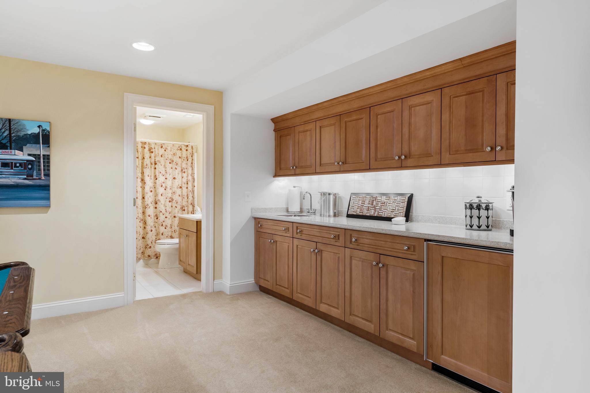 809 Matlack Drive Moorestown, NJ 08057 - Photo 52 of 67 a kitchen with granite countertop cabinets sink and window