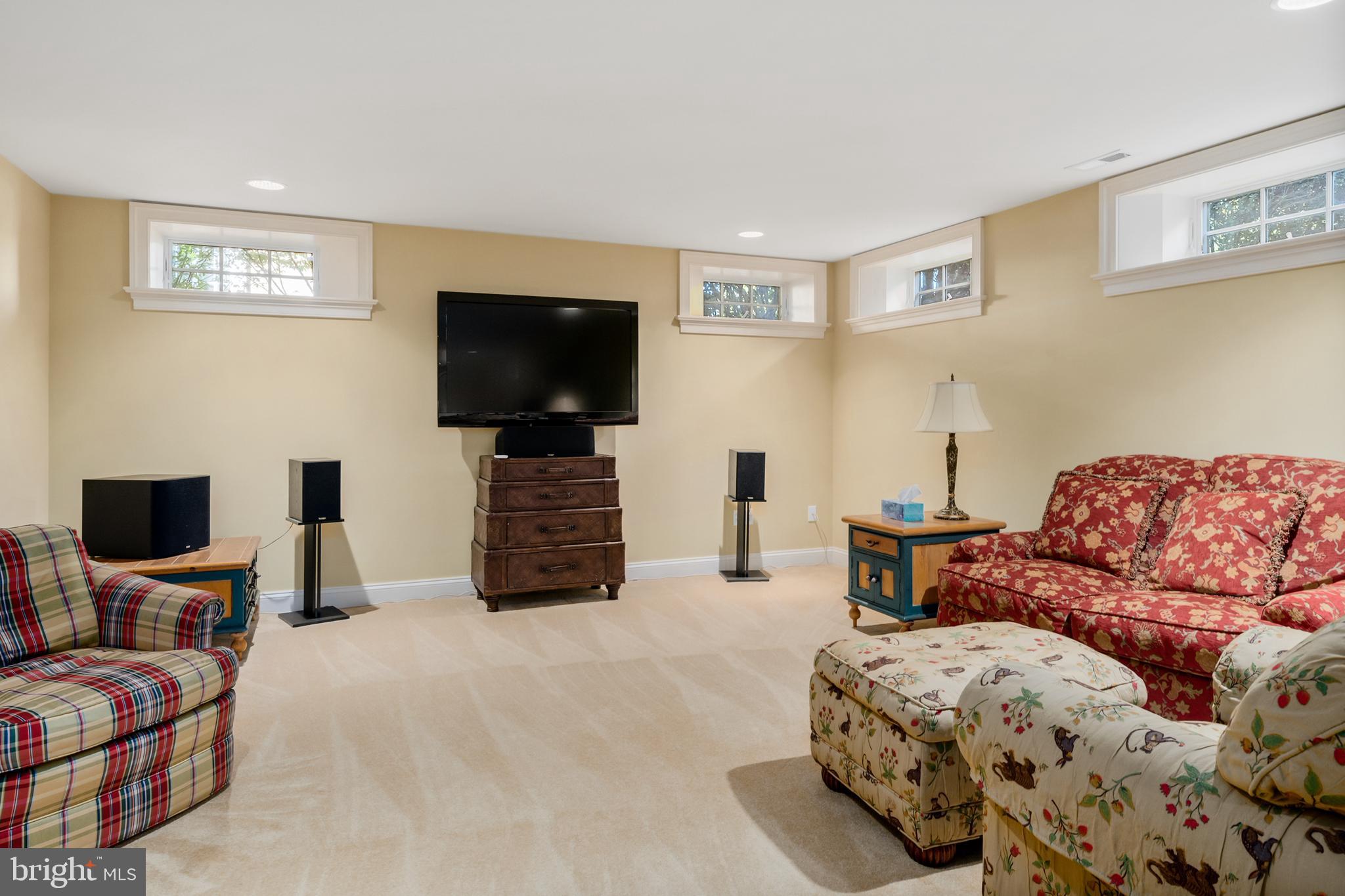 809 Matlack Drive Moorestown, NJ 08057 - Photo 55 of 67 a living room with furniture and a flat screen tv
